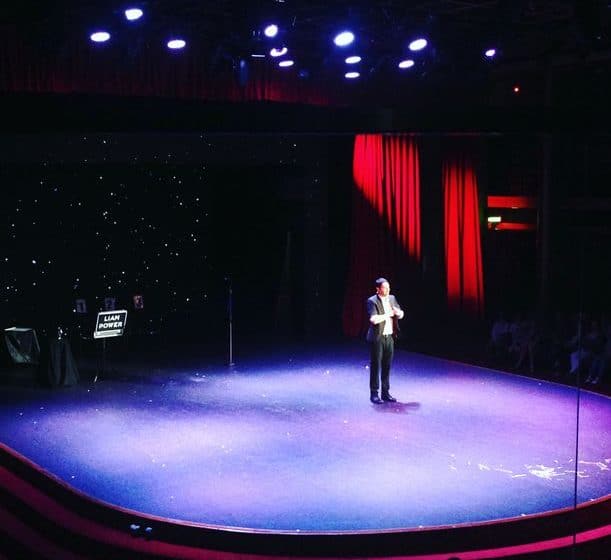 Magician Sydney | Liam Power performing a stage show on a cruise ship